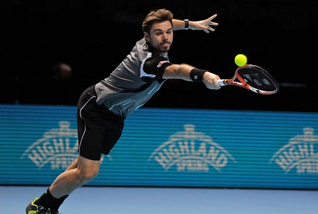 Tennis player showing athleticism in his match aganist Federer in semi's of the tennis world tour finals