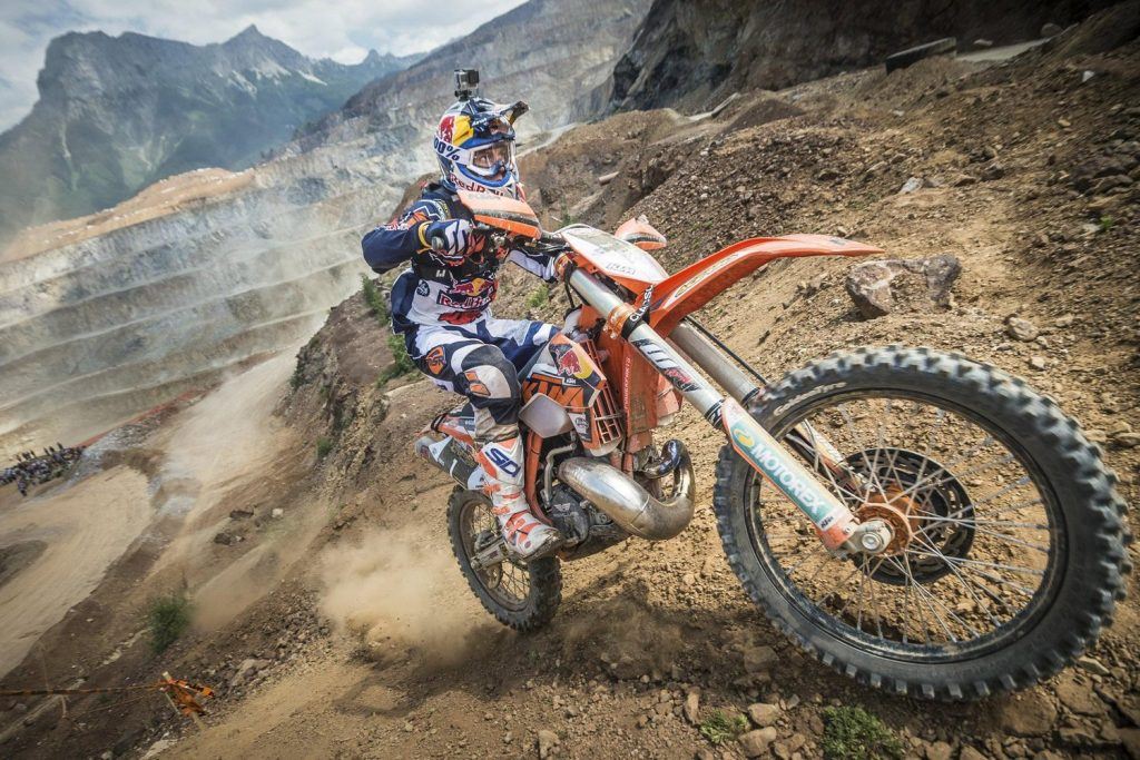 Riding up hill gopro attached at the Red Bull Hare Scramble Erzbergrodeo, one of the bucket List events for Two-Wheel Addicts 