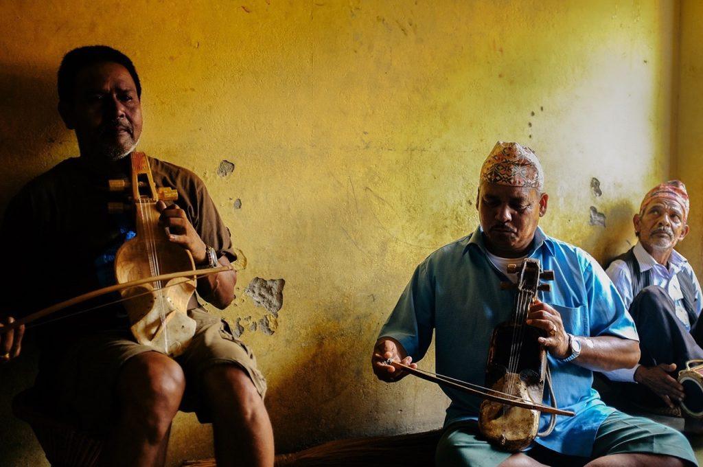 Off the tourist trail Nepal, Gorkha where locals are playing traditional intruments 