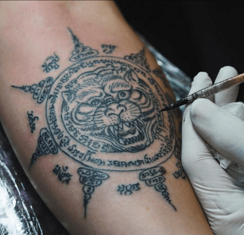 pai thailand cross tattoo