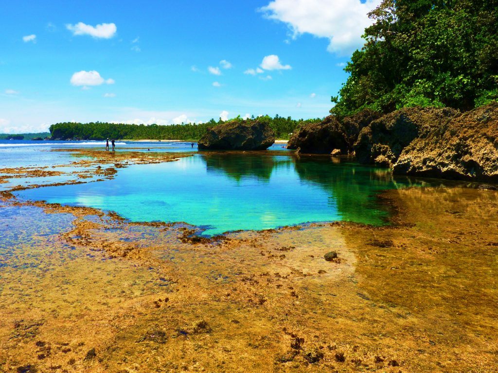 Siargao Island, Philippines swimming in tidal pools. 