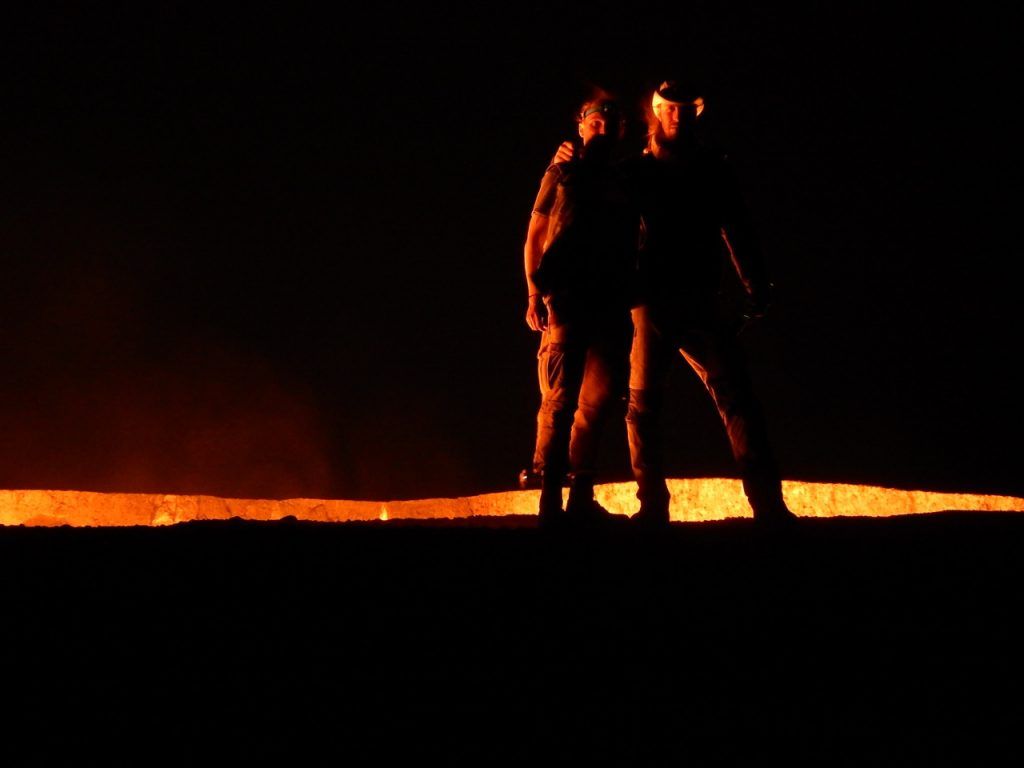 standing next to Darvaza gas crater the door to hell