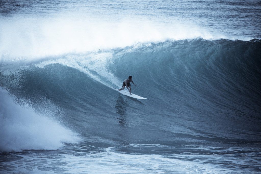 Surfer at UIuwatu in Bali 