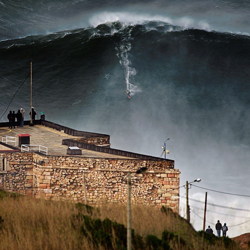 Garrett McNamara surfing in Nazare, Portugal adrenalin rush 