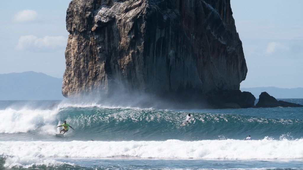 surfing adventures in front of witches rock in costa rica