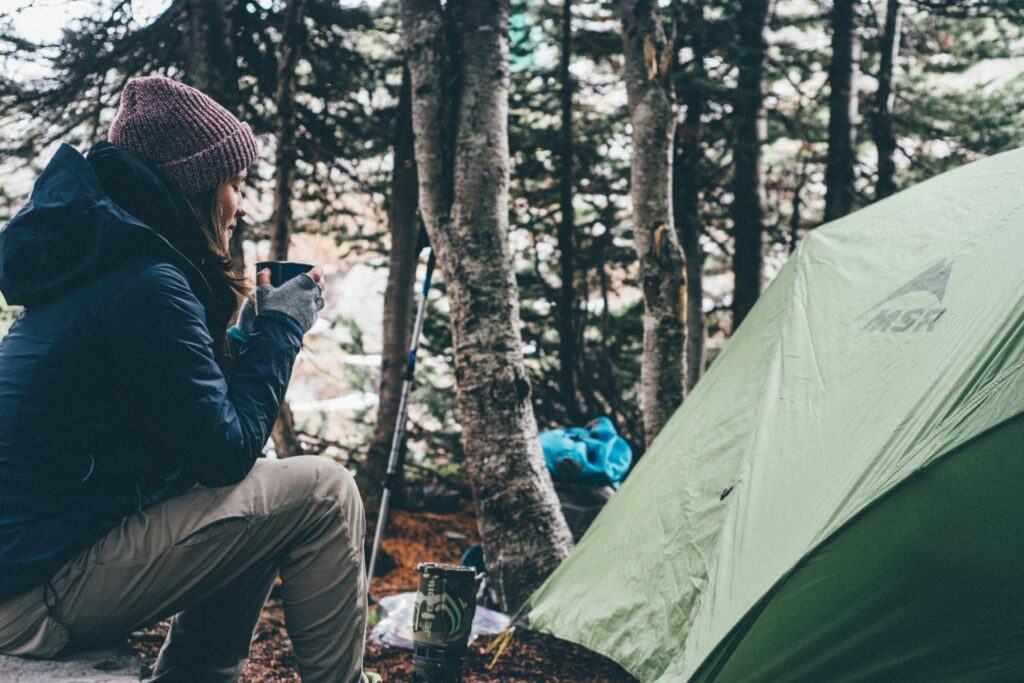 gear to bring camping, tent, warm clothing, mug